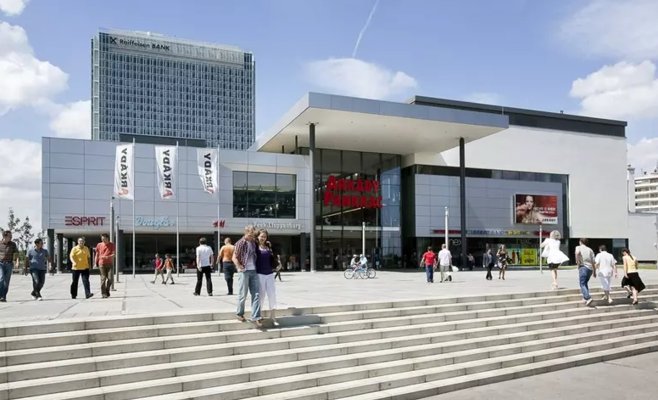 Trigea официально завершила покупку торгового центра
