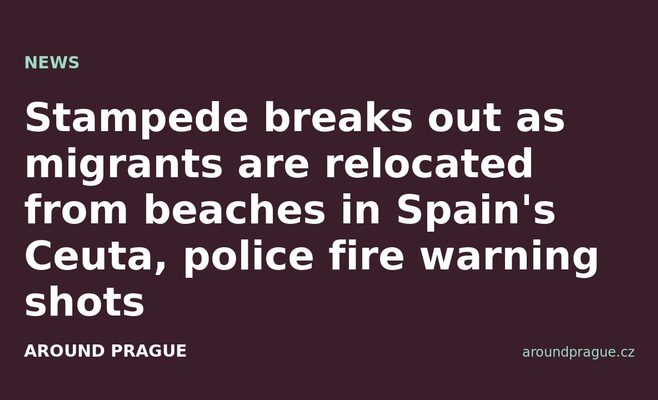 Stampede breaks out as migrants are relocated from beaches in Spain's Ceuta, police fire warning shots