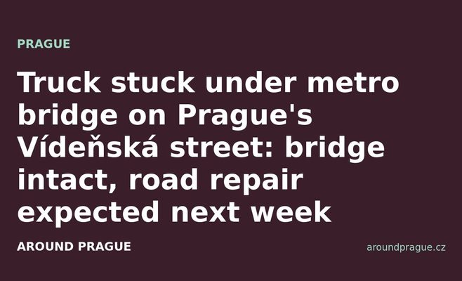 Truck stuck under metro bridge on Prague's Vídeňská street: bridge intact, road repair expected next week